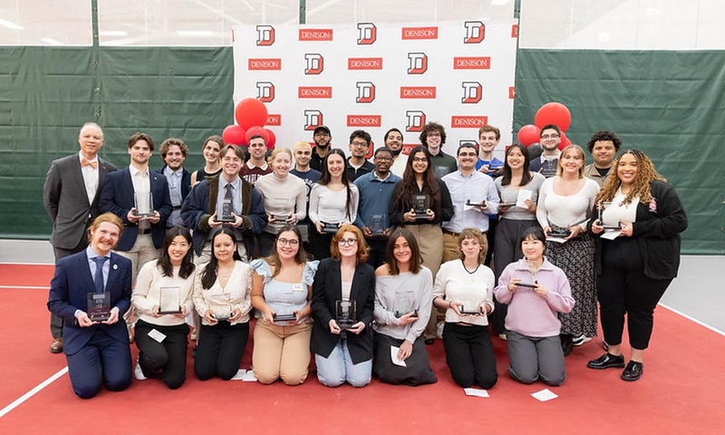 Photo of faculty and students receiving the 2025 "1831 Senior Leadership Award"