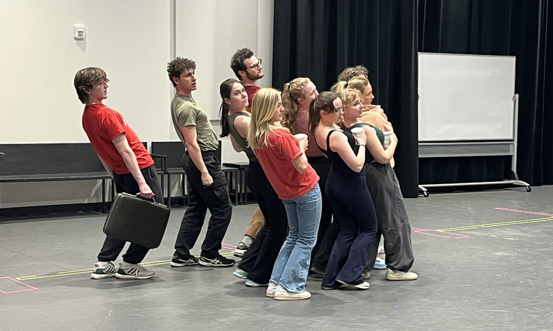 Denison students rehearsing 9-to-5 musical number.