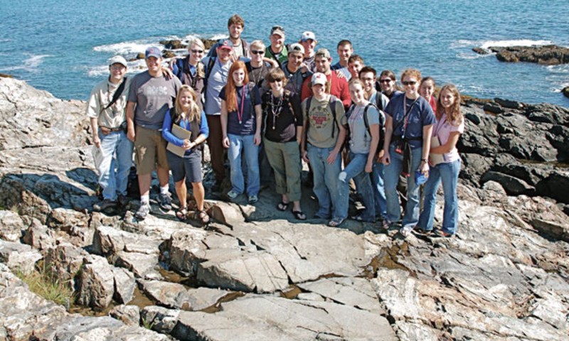 The crew standing on a mafic dike at Ogunquit.
