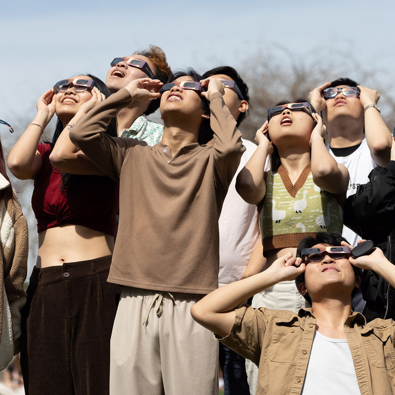 Students watching the solar eclipse