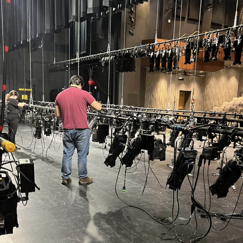 Rigging lights back stage.