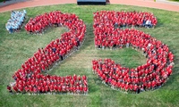 Aerial photo of the Class of 2025 forming a large "'25" on Reese~Shackelford Common