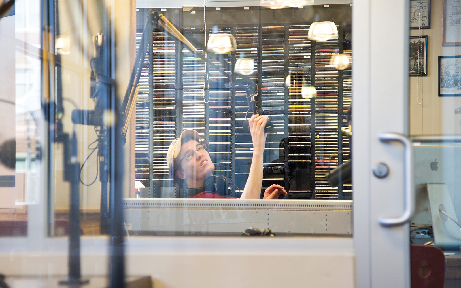 I was just walking around campus and saw this D.J. in the booth. I think he was pretty psyched to be photographed. He gave me the thumbs up, and I kept firing away.
