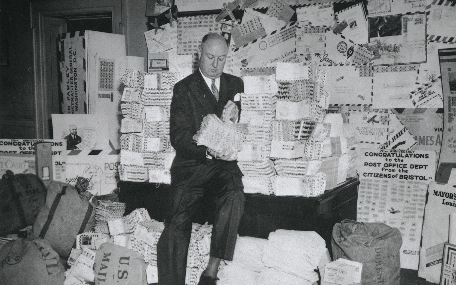 In May of 1938, hundreds of letters were mailed during National Air Mail Week - a campaign in which the USPS encouraged folks to send air mail to celebrate 20 years of "flying letters" in the United States. Here, Postmaster General James A.… In May of 1938, hundreds of letters were mailed during National Air Mail Week - a campaign in which the USPS encouraged folks to send air mail to celebrate 20 years of "flying letters" in the United States. Here, Postmaster General James A.…