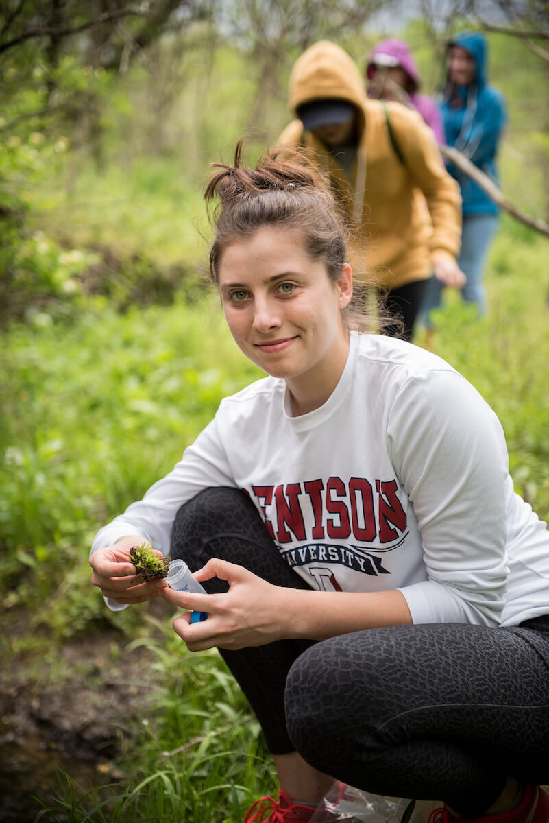 Student collecting samples at the Bio Reserve