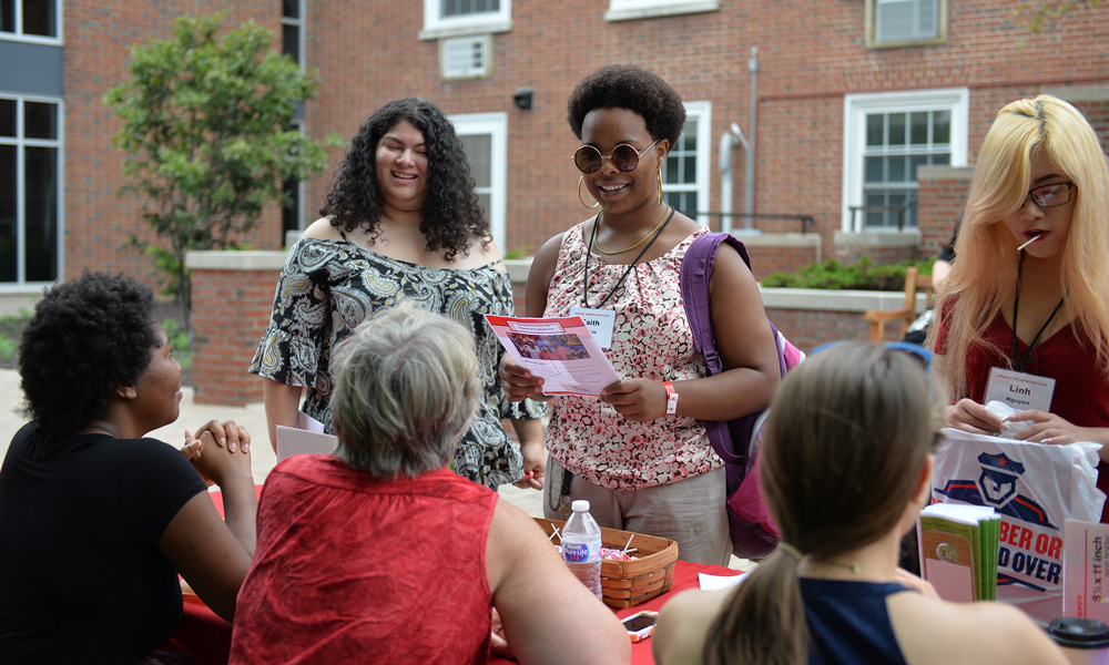 Students signing into their residence halls